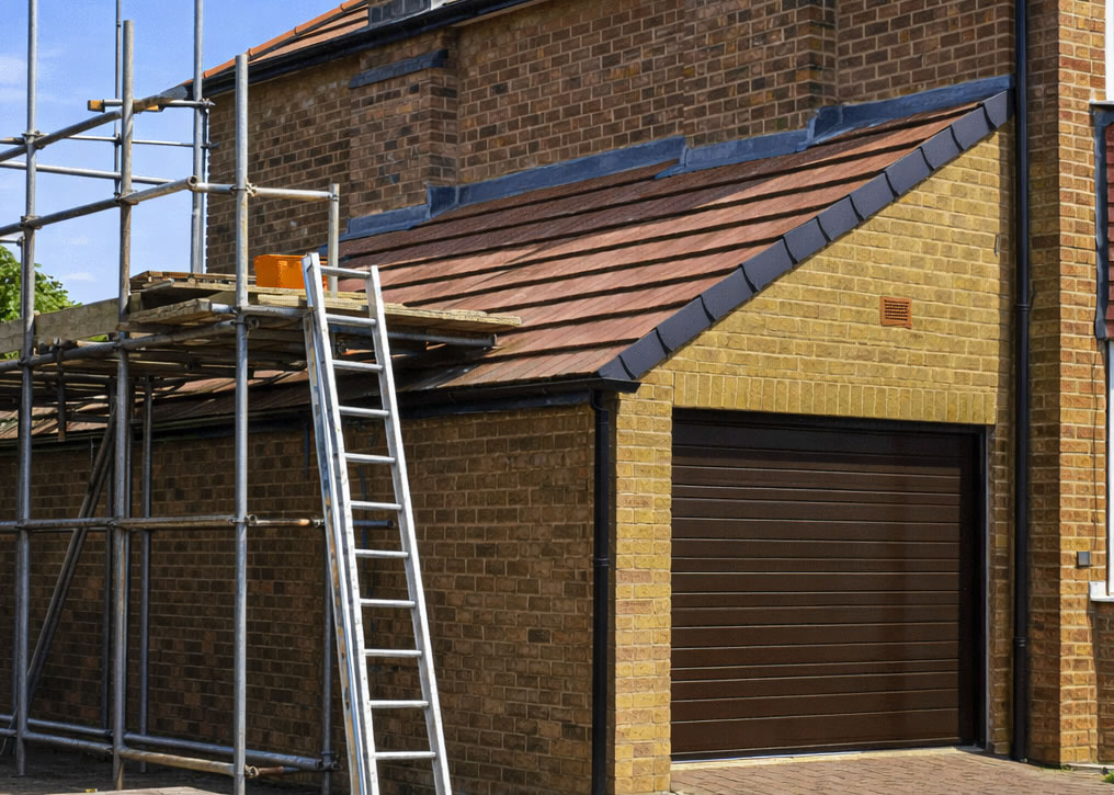 scaffolding for the pitched garage roof repairs